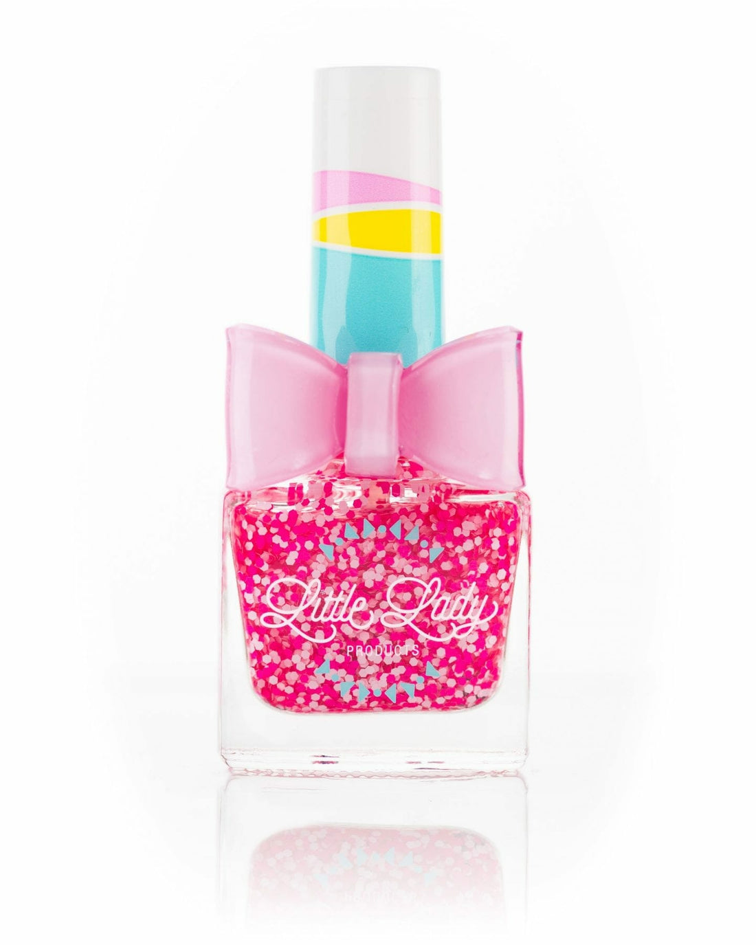 Princess Kisses pink nail polish bottle with an adorable bow, designed for kids, offering a berry scent and fun, safe, stylish mini-manicure experience.