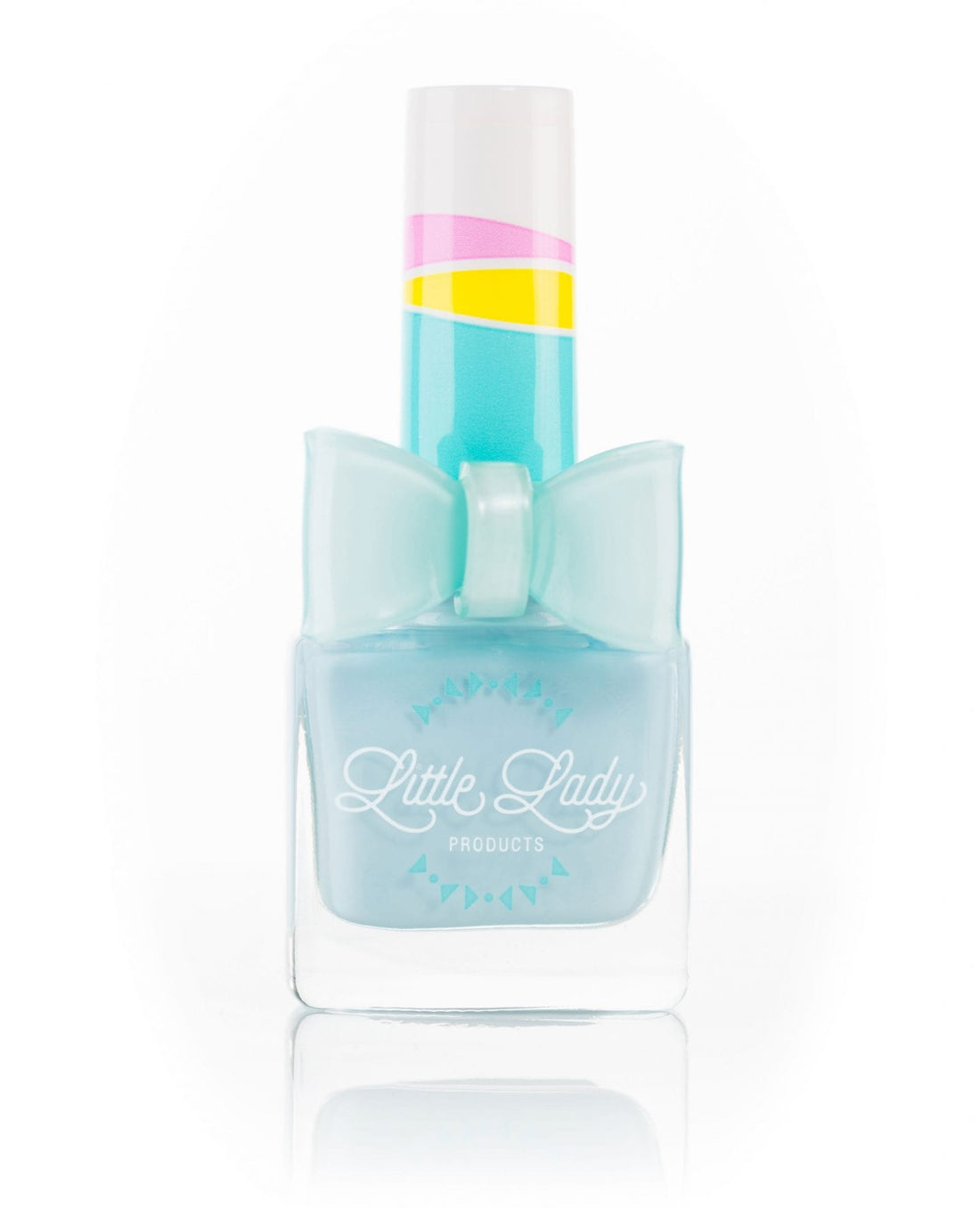 Tropical Tango nail polish bottle, designed for kids, with a logo close-up, embodying fun and safety from Little Lady Products.