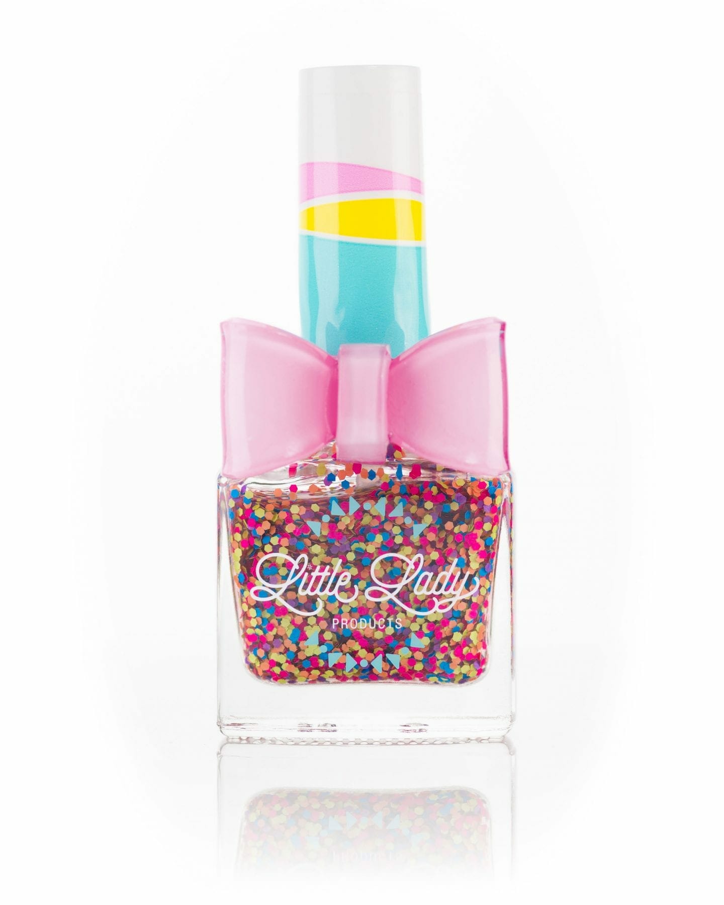 Rainbow Bubbles nail polish, a fruity-scented, kid-friendly product, features a cute pink bow. Perfect for a colorful, safe mini-manicure from Little Lady Products.