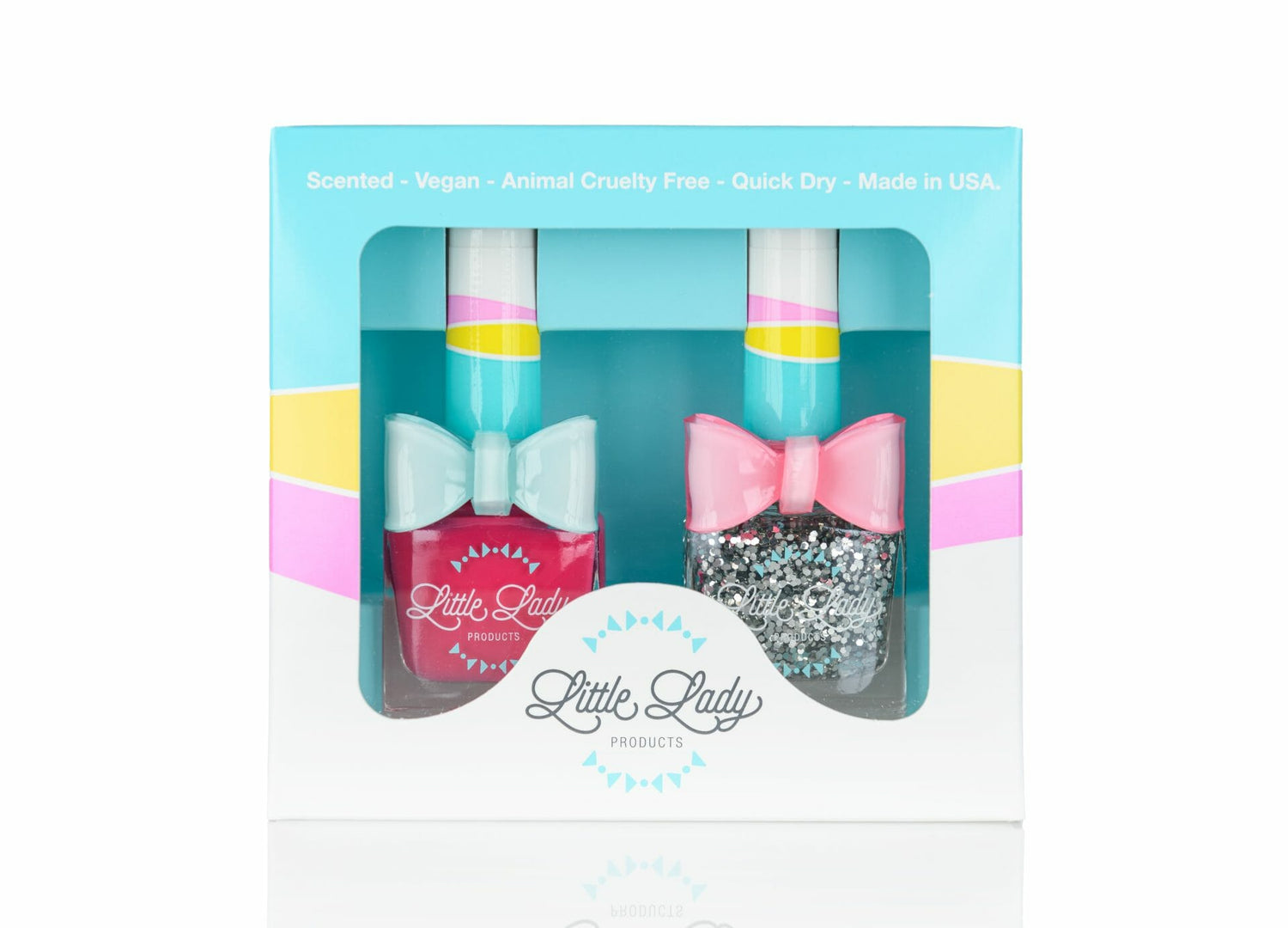 Fairy Duo set includes Fruit Fairy and Fairy Dust nail polishes, each in a box with a decorative pink bow, perfect for a magical mini-manicure experience.