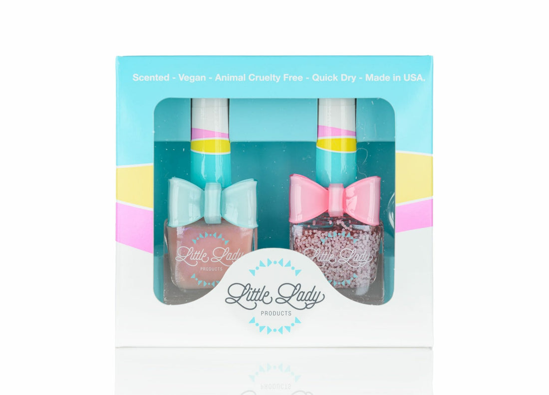 Rosey Ballerina Duo: A boxed set of two nail polishes, each adorned with a pink bow, designed for kids&
