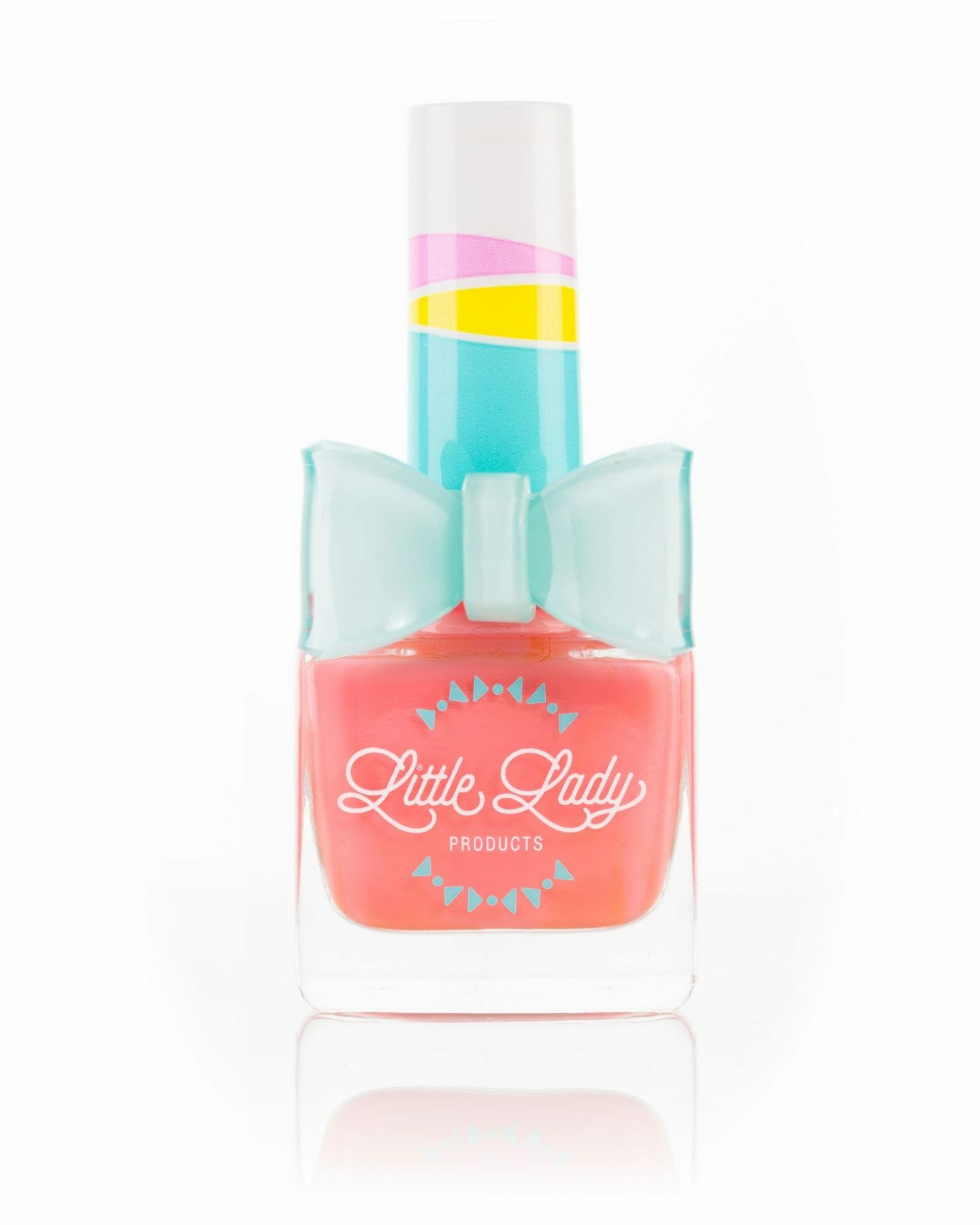 Just Peachy nail polish bottle featuring a peachy-orange shade with a fresh peach scent, designed for kids. Includes an adorable bow ring accessory.