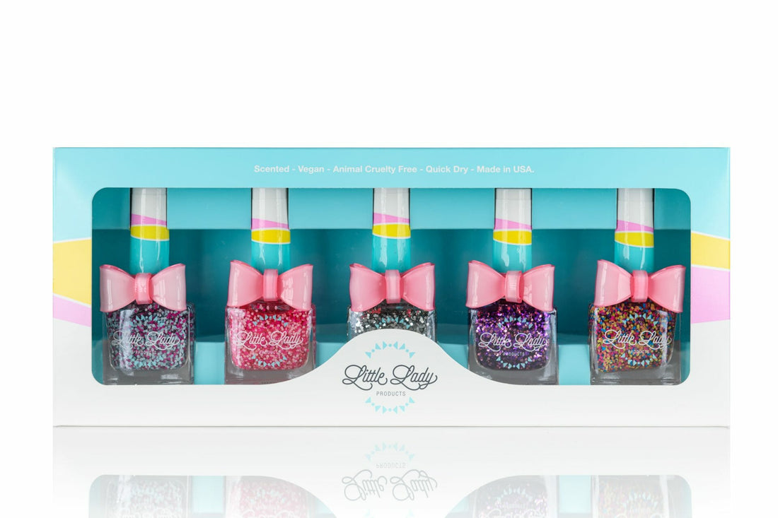 Confetti Glitter Collection Kit with top-selling glitter colors in a decorative box, perfect for playful, safe manicures for kids. Includes a cute bow accessory.